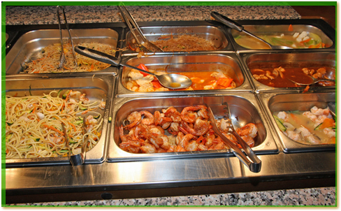 Hot food at a buffet.