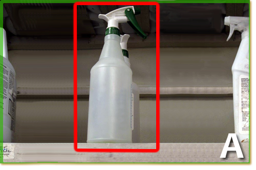 A sanitizer bottle hanging from a storage shelf.