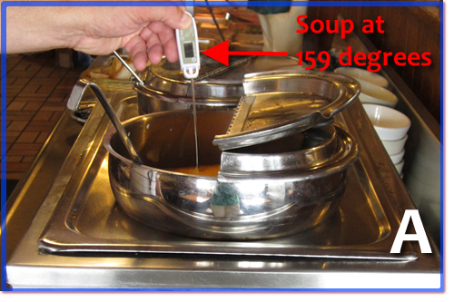 Digital Termometer in soup showing 159 degrees.